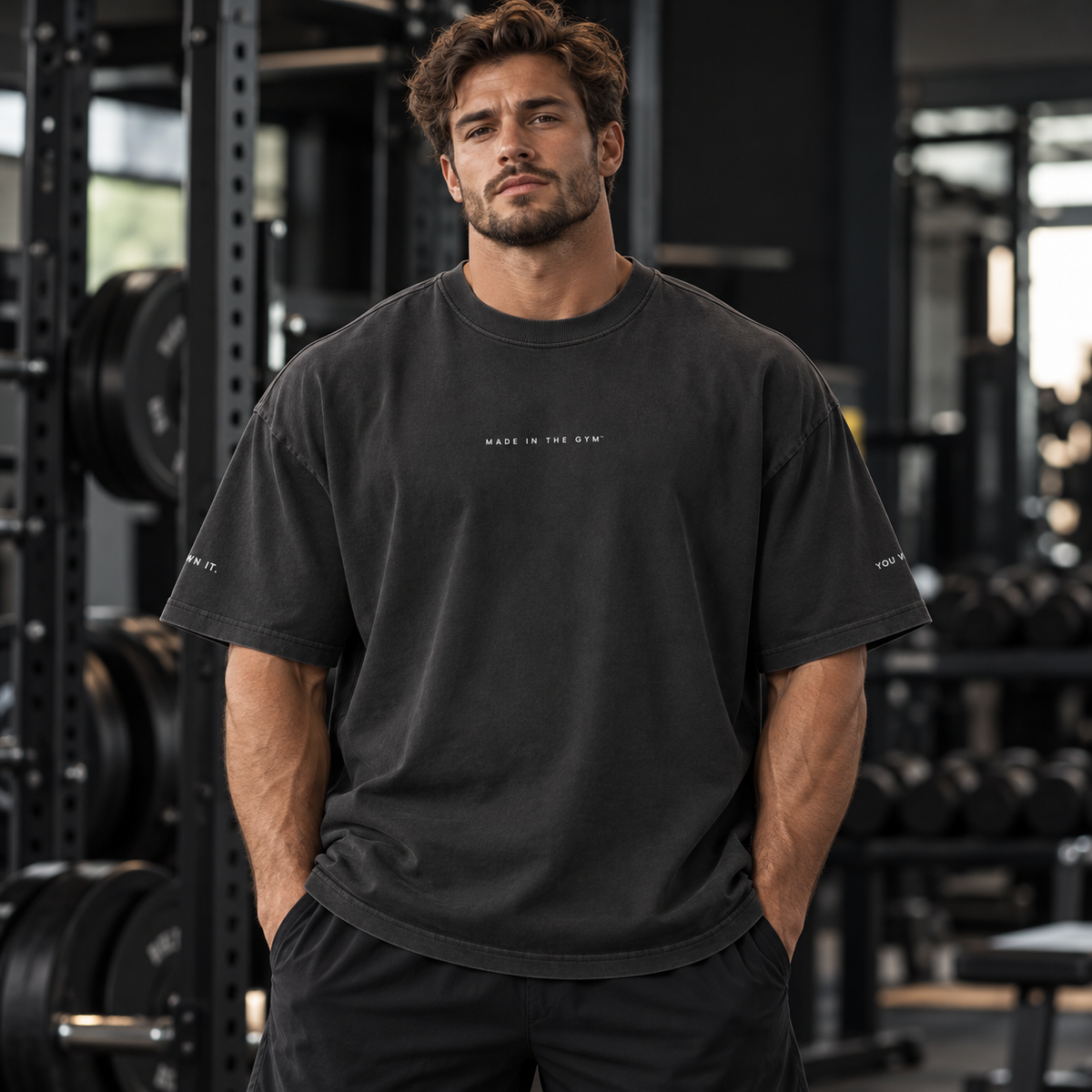 Athlete modeling the MITG Oversized Faded Tee