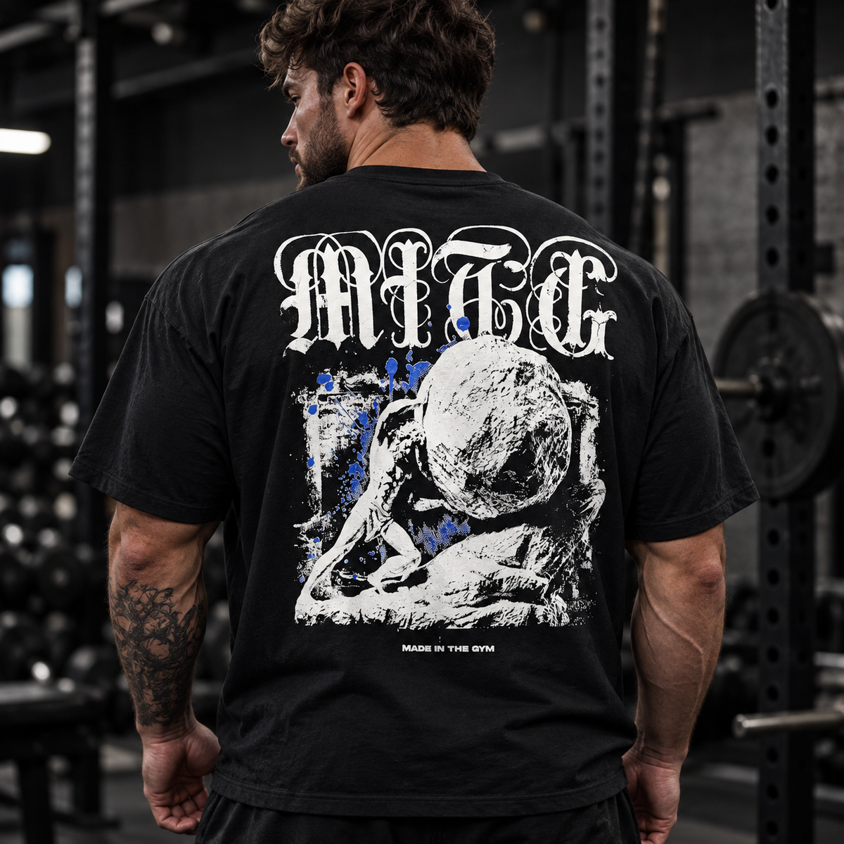 Athlete wearing The Burden tee with the Sisyphus graphic on the back